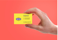 Hand Holding Yellow Business Card Mockup PSD Free Download